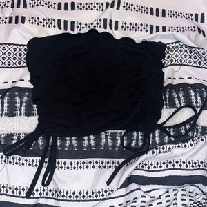 A black tube top that is adjustable